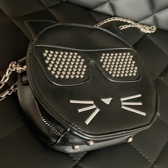 This is a cat cross body bag. - Picture 3 of 3